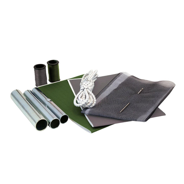 Contents laid out of Coghlans nylon tent repair kit