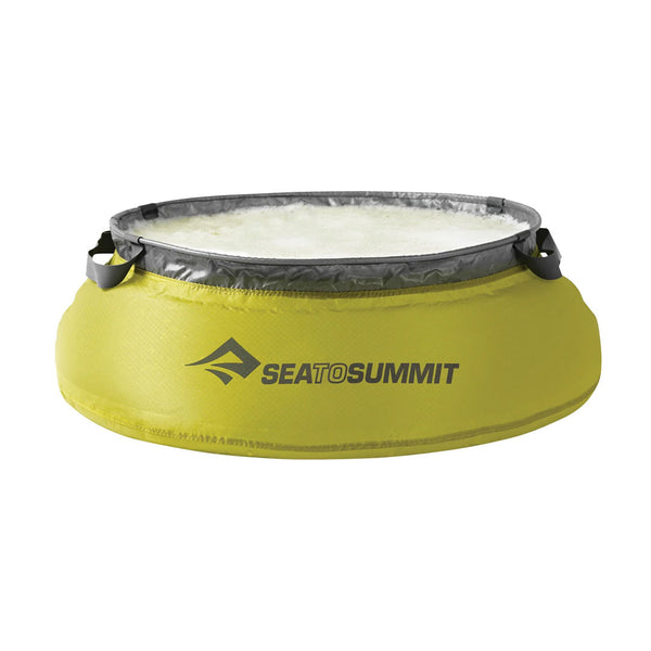 Front detail of a Sea To Summit Ultra-Sil collapsible fabric kitchen sink filled with water