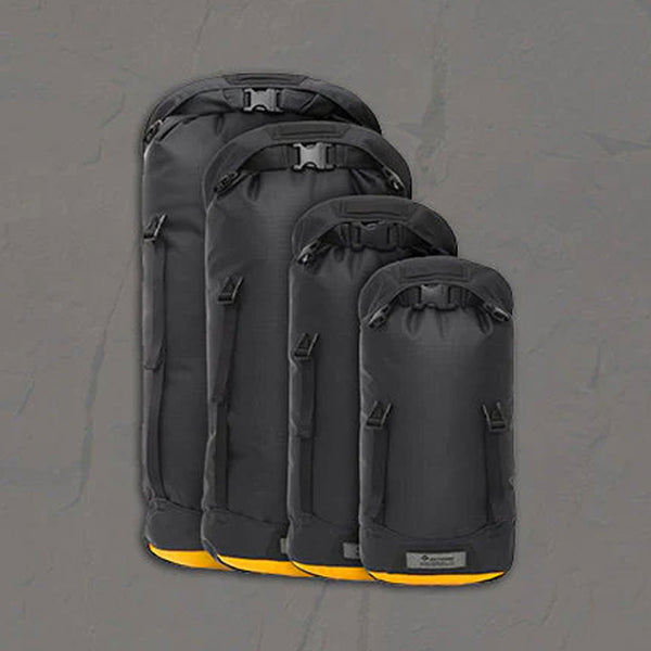 Four different sizes next to each other of Sea To Summit Evac heavy duty dry bags