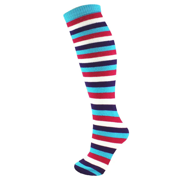 Manbi Striped Thermal Ski Socks in blue and red stripes shown on a foot mannaquin