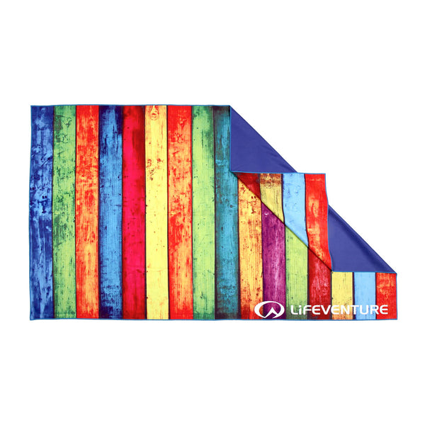 Lifeventure soft fibre travel towel in striped plank print laid out flat showing the reverse blue backing