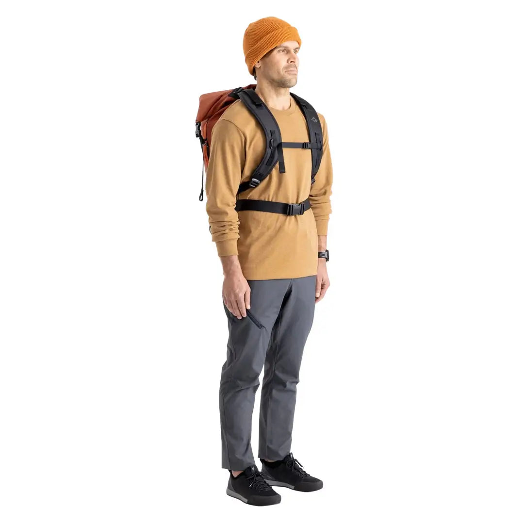 Front shot of a man wearing a Sea To Summit Big River Dry Backpack in 50 litres red showing the strap details