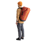 Back shot of a man wearing a Sea To Summit Big River Dry Backpack in 75 litres red 