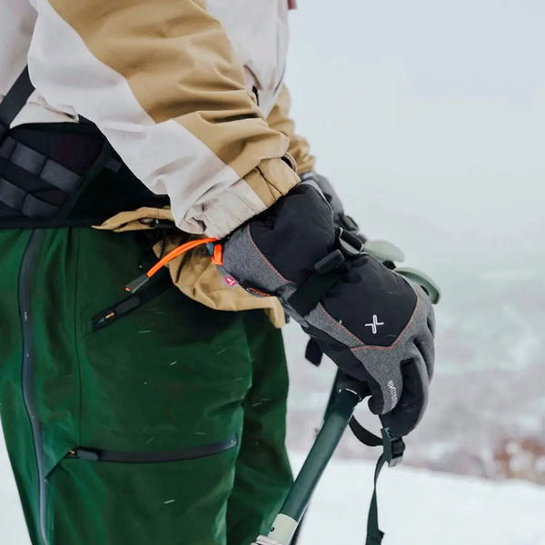 Person wearing a pair of Extremities waterproof Torres insulated gloves whilst skiing 