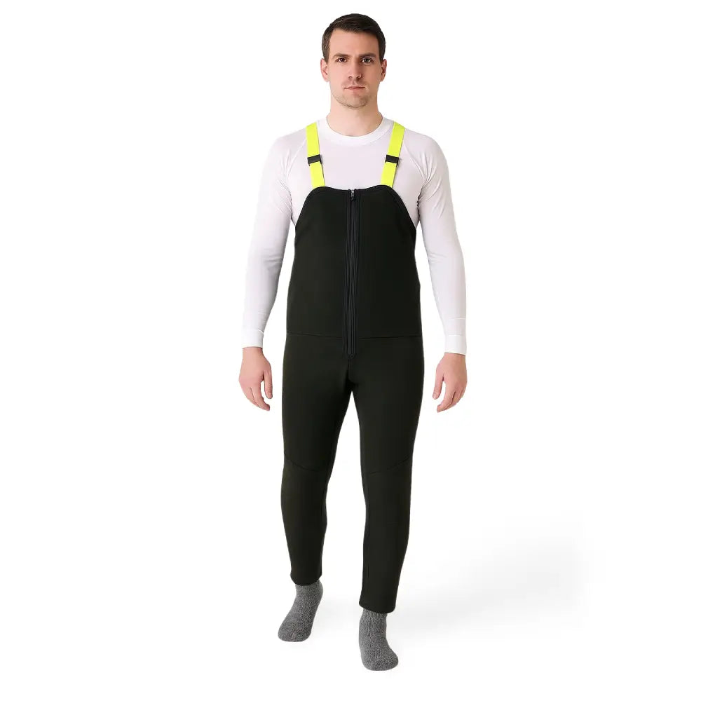 Man wearing a Sub Zero Fleece Unisex Salopettes in black shown from the front on a white background