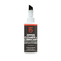 Bottle of Gear Aid zipper cleaner and lubricant with a white brush cap on a white background
