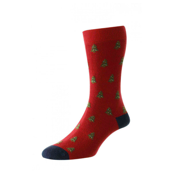 Studio shot on a white background of a HJ Hall Cotton Rich Men's sock in a foot dummy showing the red Christmas tree design