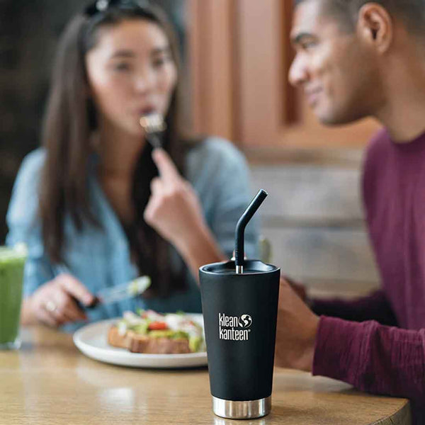Klean Kanteen 8mm stainless steel straws with silicon sipping tip being used with an insulated mug
