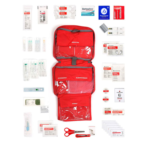 Lifesystems Solo Traveller sterile first aid kit contents laid out flat