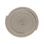 Paired Lifesystems insect repellent coils before being pressed out on a white background