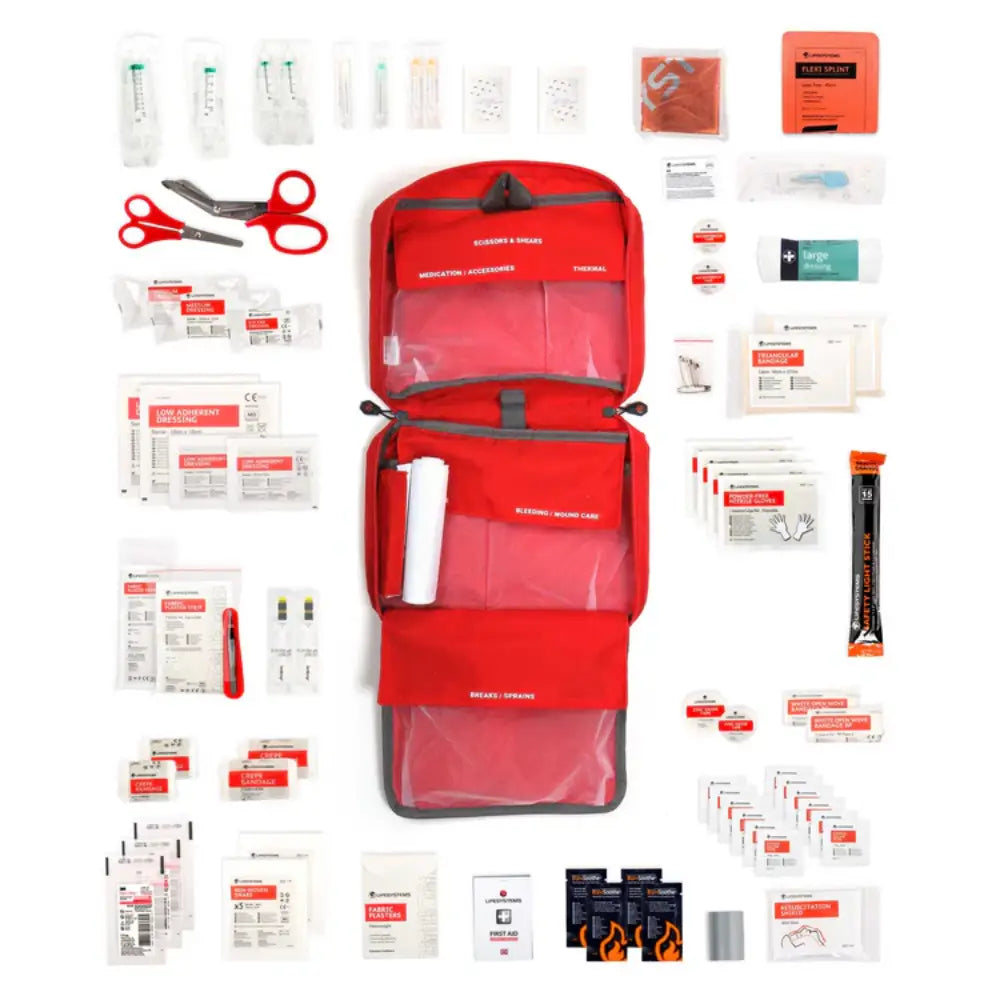 Lifesystems Mountain Leader Pro First Aid Kit contents laid out flat on a white background