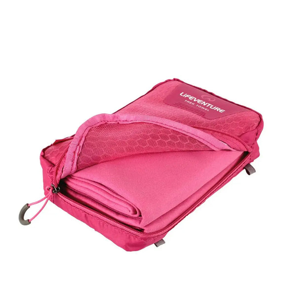 Lifeventure SoftFibre travel towel in pink packed in its zipped travel case 