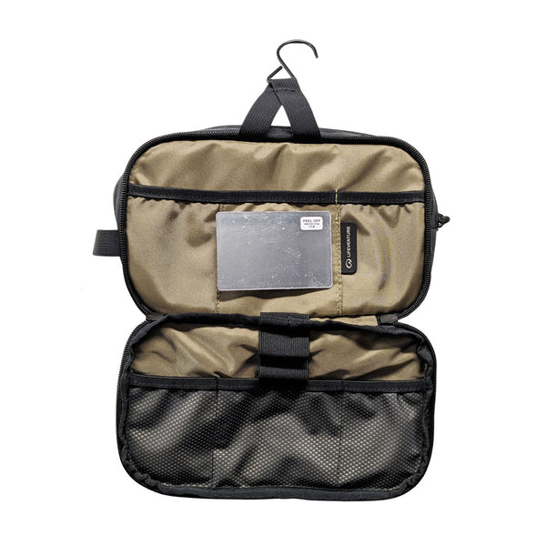 Lifeventure X-Pac travel wash bag front compartment opened out to show storage pouches and hanging hook
