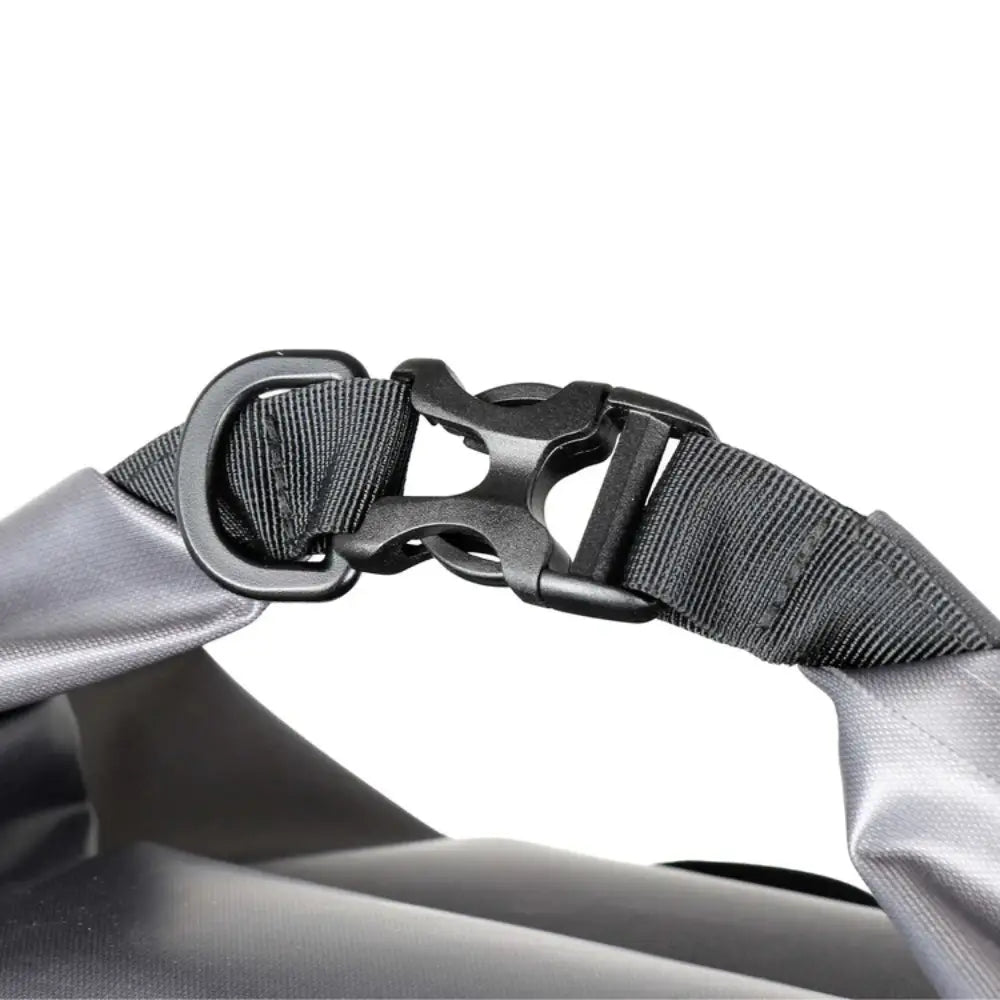 Close-up of a Lifeventure Heavy Duty Dry Bag Backpackd roll-top clip closure on a white background
