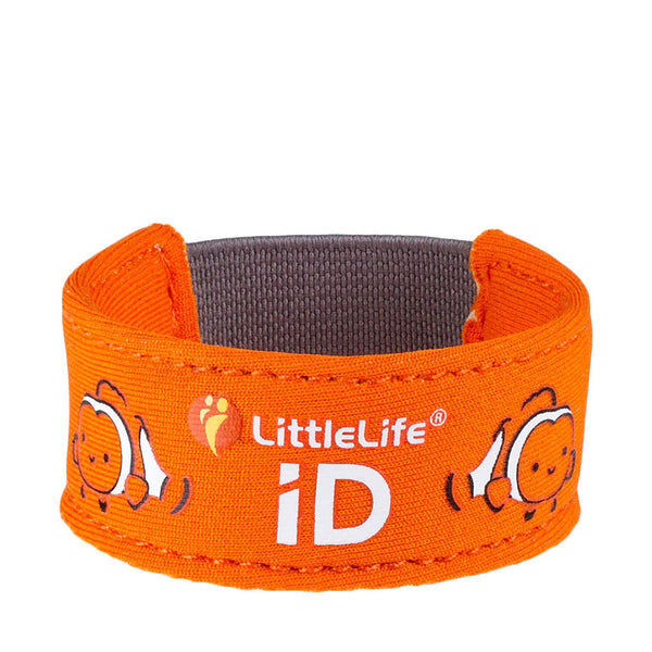 Studio shot on a white background of a Littlelife Identification wristband in the clownfish pattern