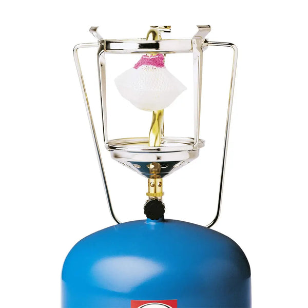 Swan neck gas lantern with a new mantle attahced on a white background