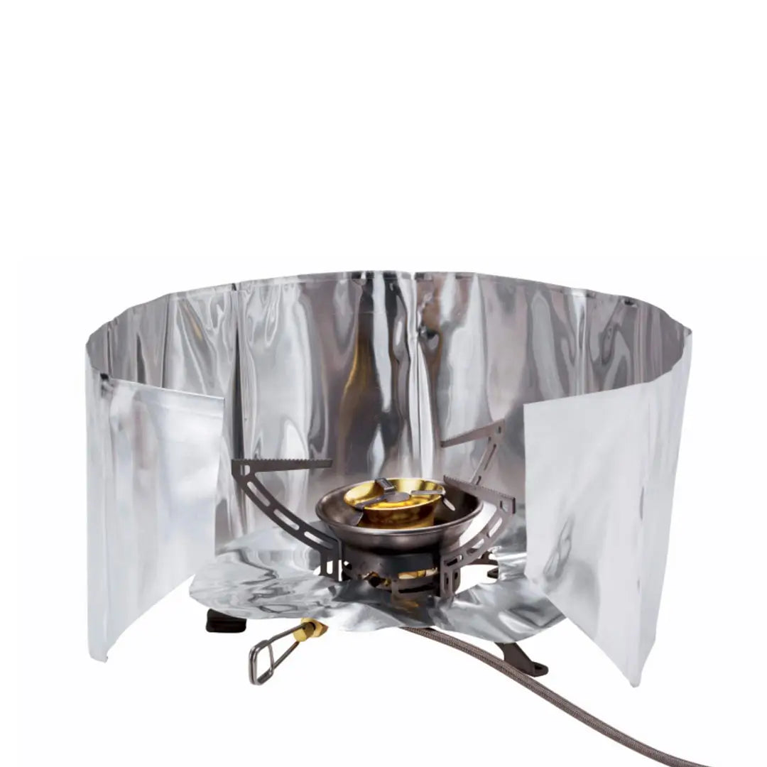 Primus windscreen and heat reflector installed around a portable backpacking gas stove on a white background
