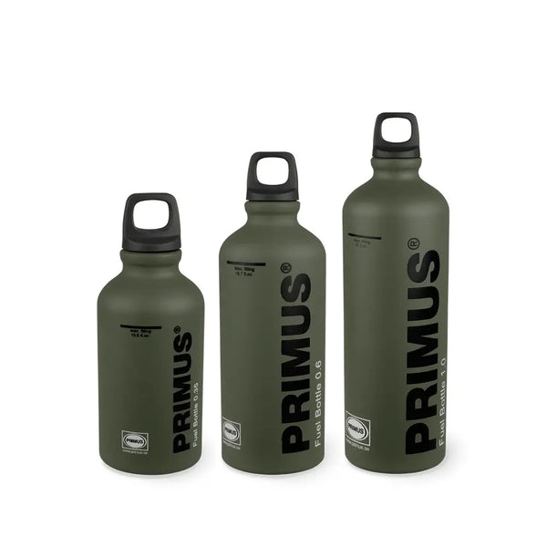 Three green Primus fuel bottles of different sizes on a white background