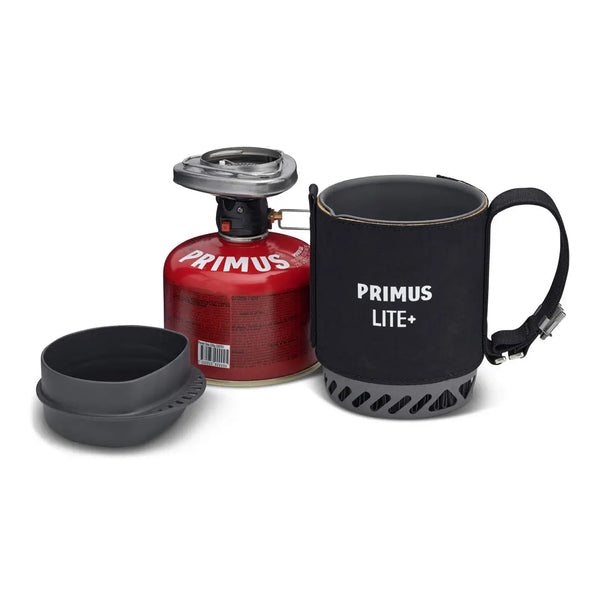 Primus Lite+ camping stove with power gas canister and bowl lid on a white background