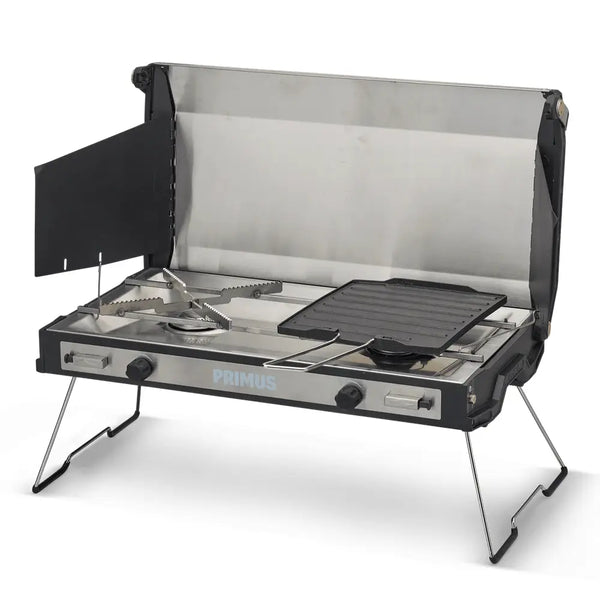 Primus Tupike camping gas stove set-up for cooking on a white background