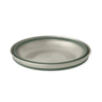 Fully collapsed Sea To Summit Detour Stainless Steel Collapsible Bowl in green colour