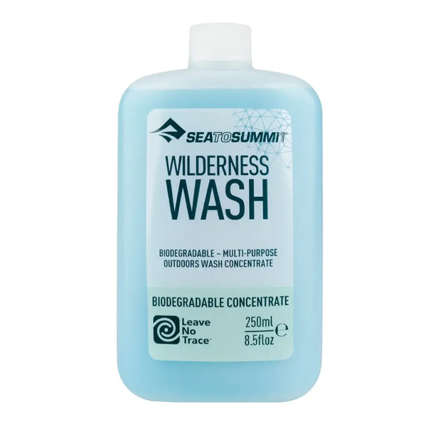A bottle of Sea to Summit Wilderness Wash biodegradable multi-purpose outdoor wash concentrate, 250ml (8.5 fl oz), shown on a plain white background.