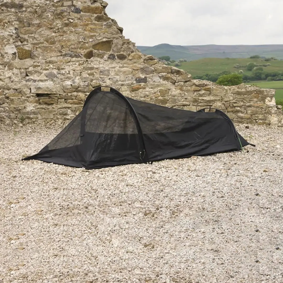 Lifestyle shot outdoors of the inner mosquito net tent that forms part of Snugpaks Ionosphere