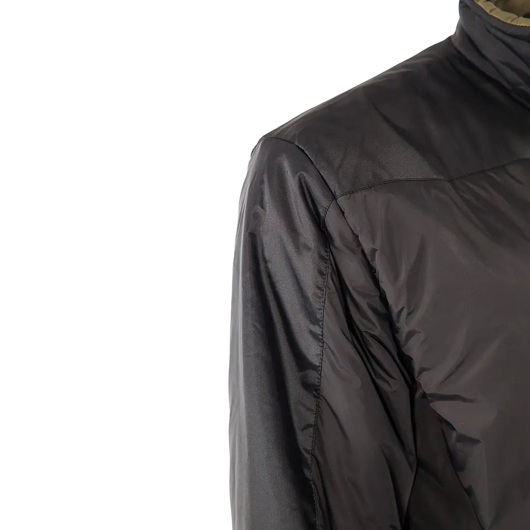 Shoulder detail shot of Snugpak Sleeka Elite Reversible insulated windproof jacket in black/olive