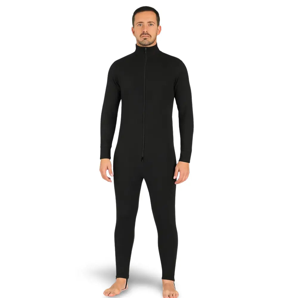 Man wearing a Sub Zero Factor 2 thermal mid layer onesie in black colour photographed on a white background