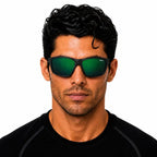 Man wearing a pair of Sinner Eyak polarised sunglasses in Cry Black on a white background