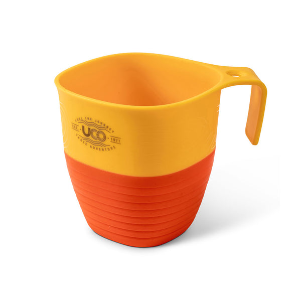 UCO collapsible camp mug in orange colour showing the front detail photographed on a white background